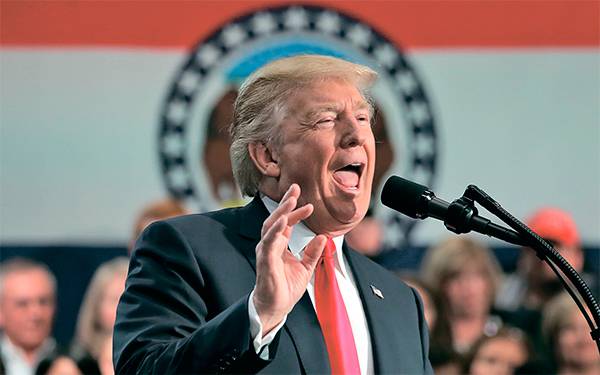 Дональд Трамп все-таки убедил американцев, что снижает налоги 08-02.jpg ТАСС
