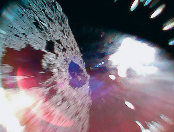 Снимок, сделанный во время высадки на астероид Рюгу 036_rusrep_25-1.jpg hayabusa2.jaxa.jp